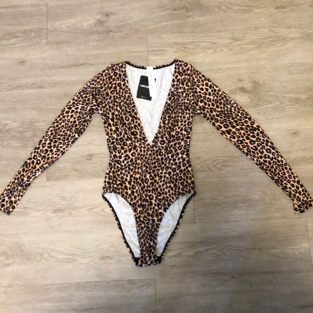 cheetah print long sleeve body suit! low cut.